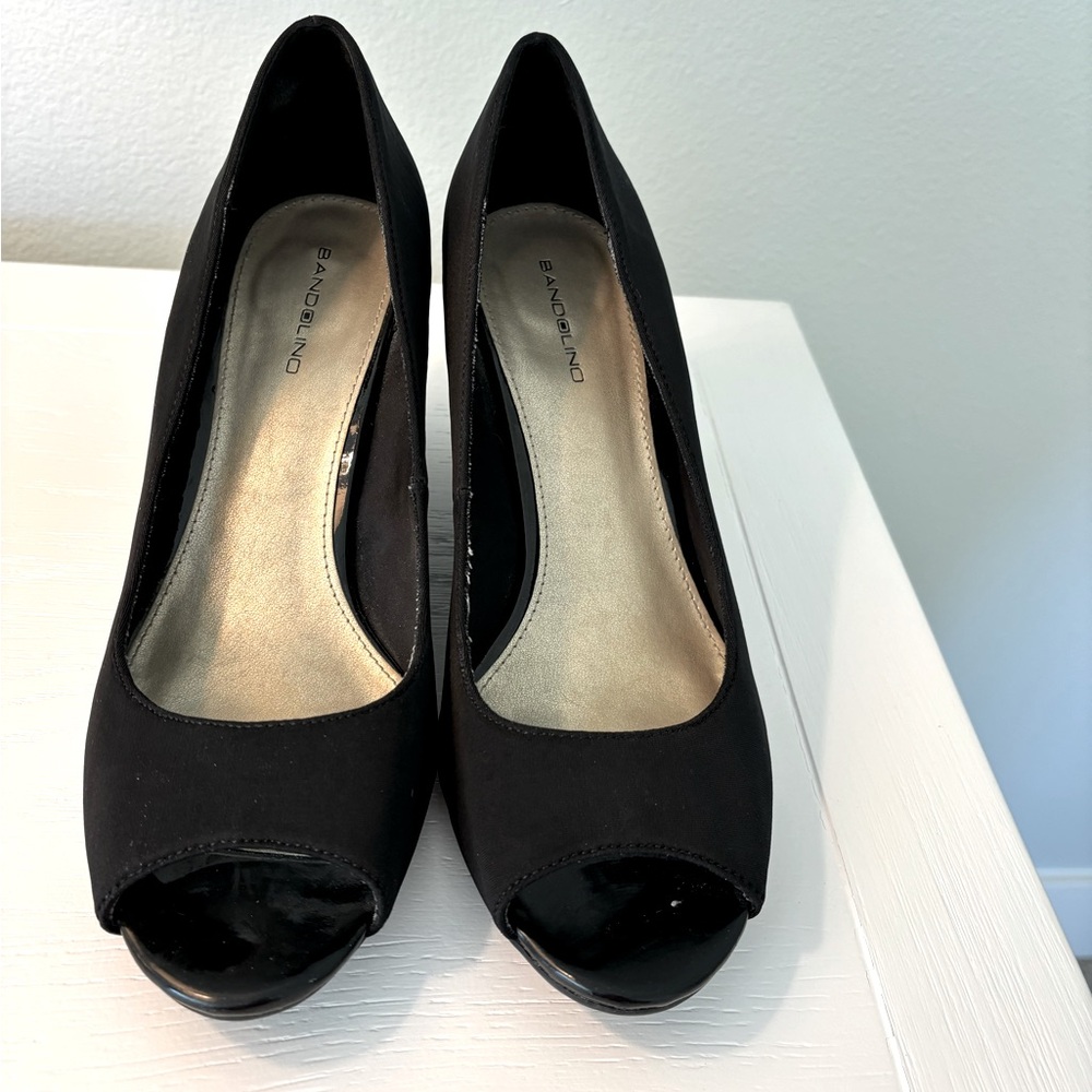 Peep toe wedge. In great condition.